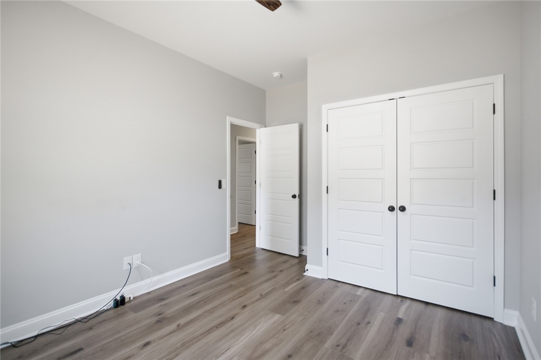 912 Watercrest Road West Union, SC 29696 - Photo 31 of 49 This spacious room features elegant flooring and convenient closet space, offering comfortable living.