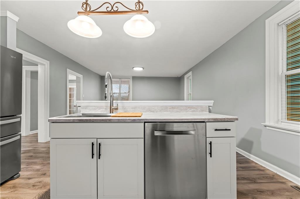 305 Perry Como Street Canonsburg, PA 15317 - Photo 15 of 33 a kitchen with a sink cabinets and window