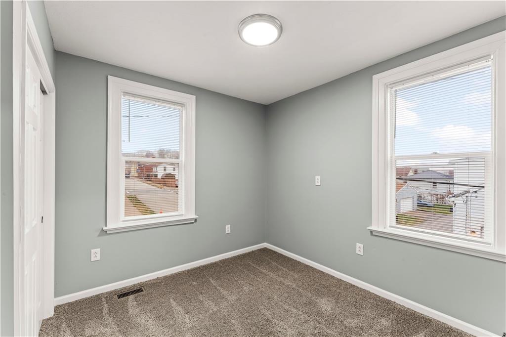 305 Perry Como Street Canonsburg, PA 15317 - Photo 17 of 33 an empty room with windows and closet
