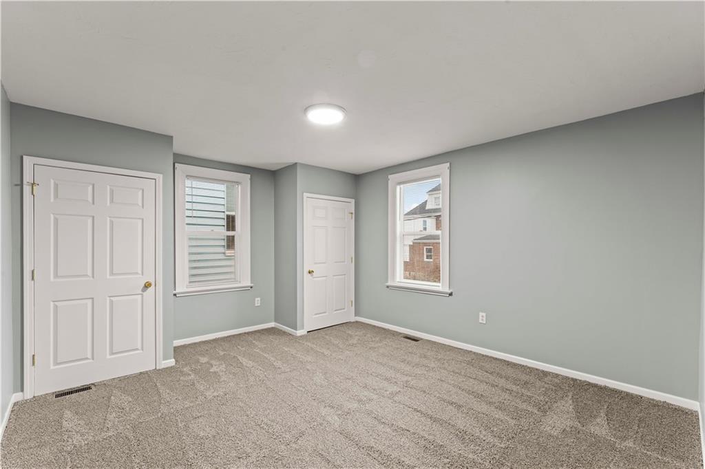 305 Perry Como Street Canonsburg, PA 15317 - Photo 18 of 24 an empty room with windows and closet