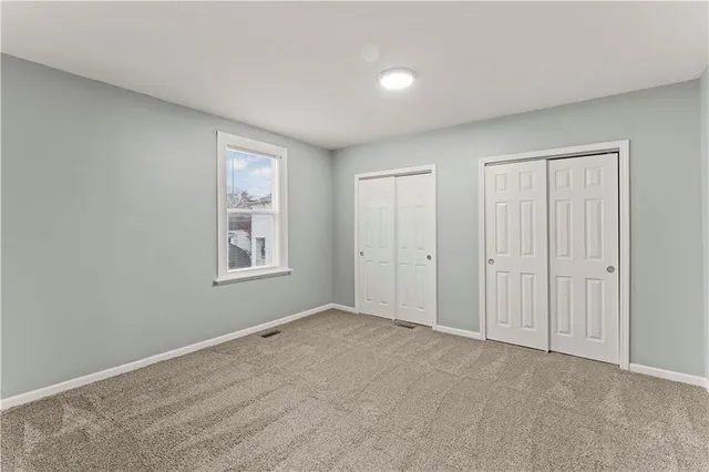 a bathroom with a sink vanity and mirror