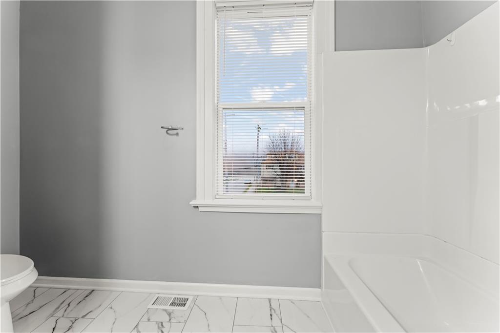 305 Perry Como Street Canonsburg, PA 15317 - Photo 29 of 33 a bathroom with a bathtub and a toilet