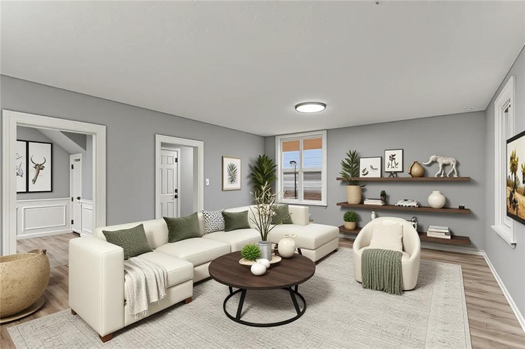 305 Perry Como Street Canonsburg, PA 15317 - Photo 8 of 33 a living room with furniture a rug and a large window