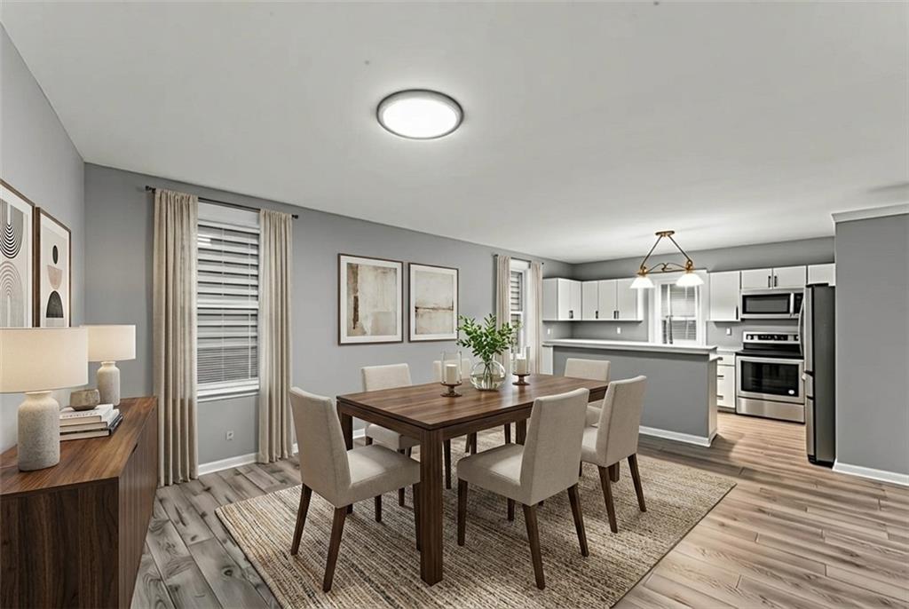 305 Perry Como Street Canonsburg, PA 15317 - Photo 10 of 33 a view of a dining room with furniture and wooden floor
