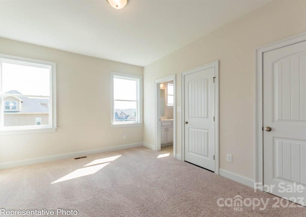 16327 Loch Raven Road Huntersville, NC 28078 - Photo 15 of 42 a view of an empty room with a window