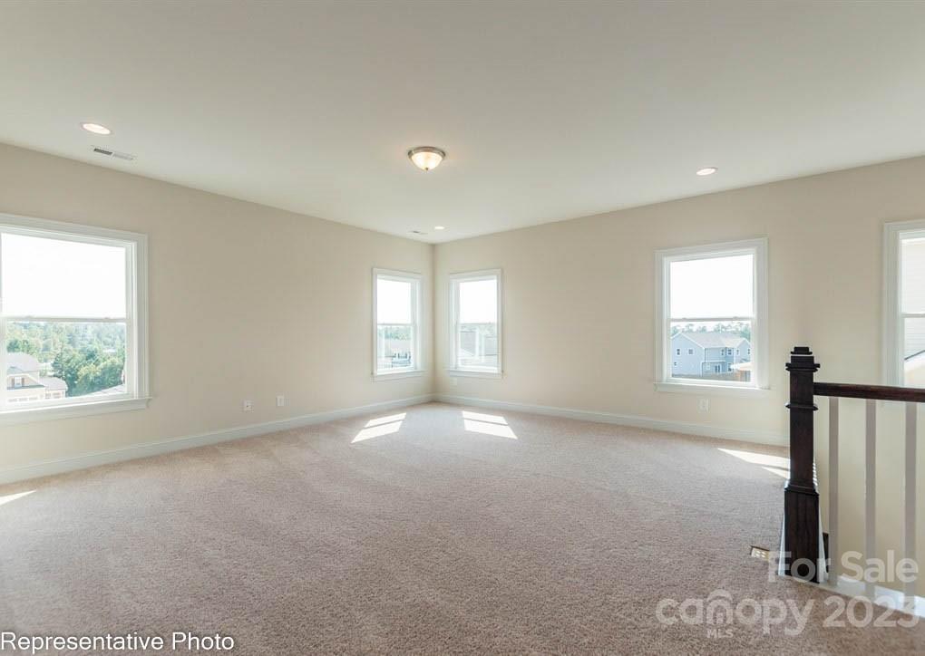 16327 Loch Raven Road Huntersville, NC 28078 - Photo 17 of 42 a view of empty room with window