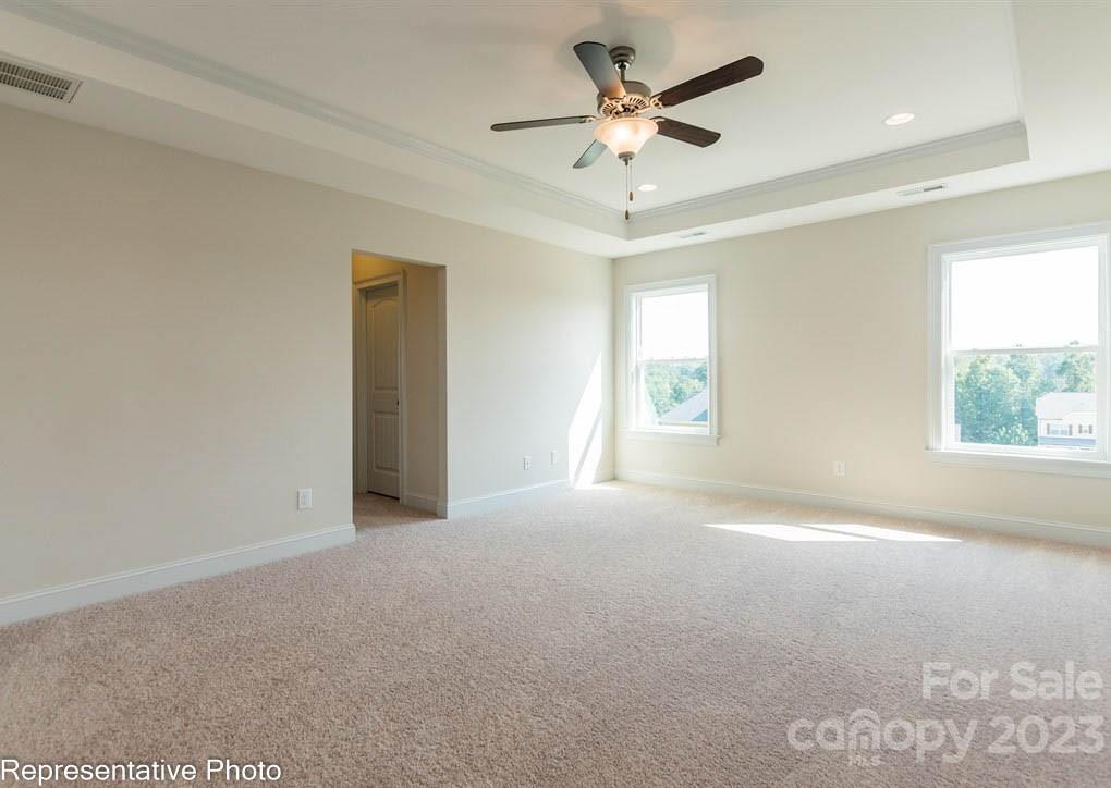 16327 Loch Raven Road Huntersville, NC 28078 - Photo 18 of 42 an empty room with windows and fan