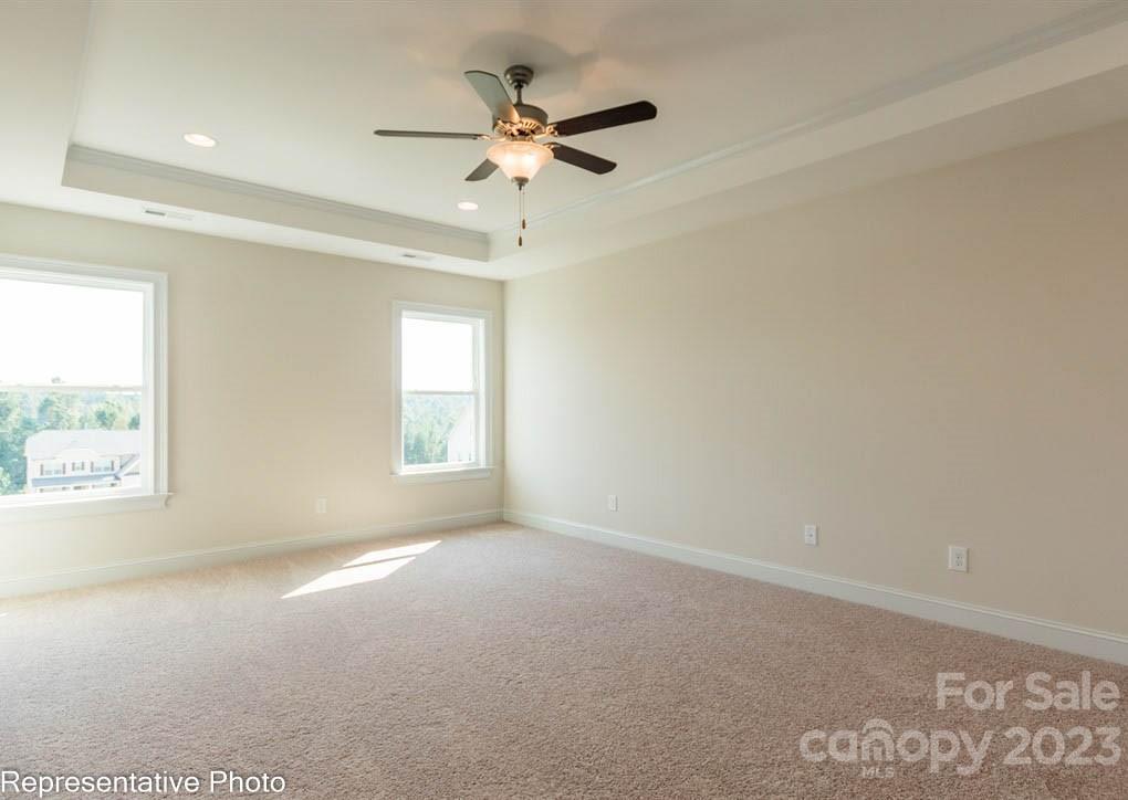 16327 Loch Raven Road Huntersville, NC 28078 - Photo 20 of 42 an empty room with windows and fan