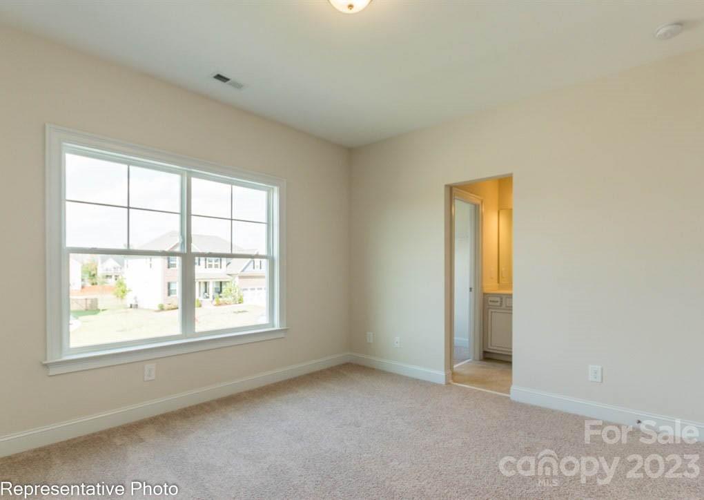16327 Loch Raven Road Huntersville, NC 28078 - Photo 25 of 42 an empty room with windows