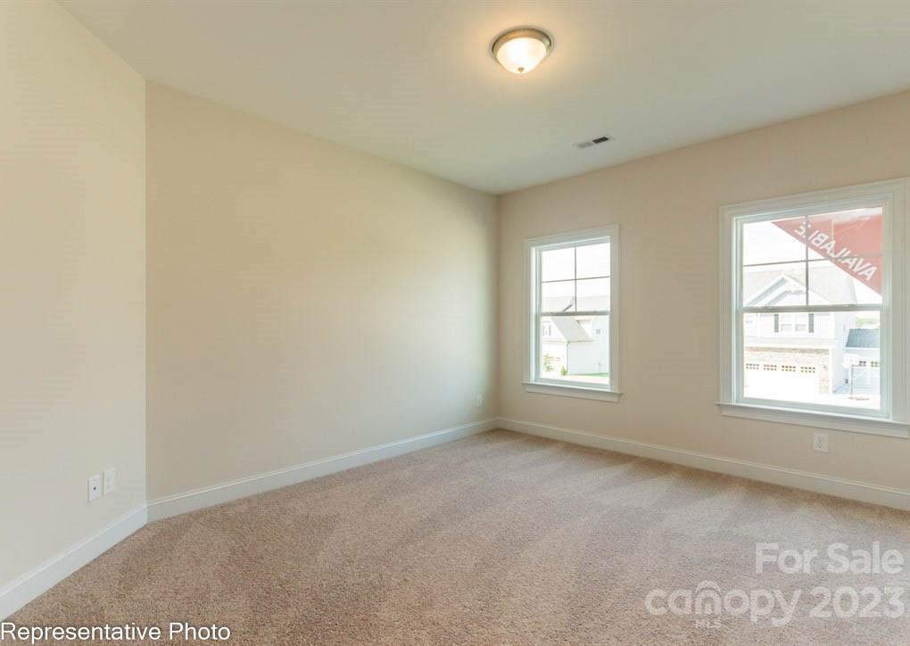 16327 Loch Raven Road Huntersville, NC 28078 - Photo 27 of 42 an empty room with a window