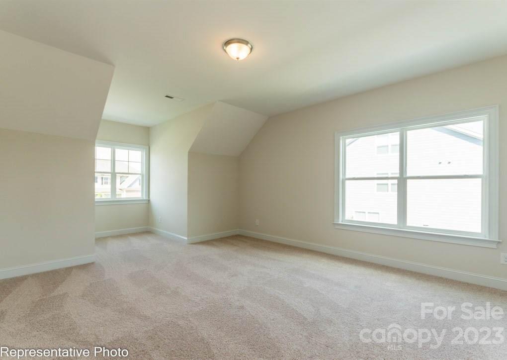 16327 Loch Raven Road Huntersville, NC 28078 - Photo 29 of 42 an empty room with a window