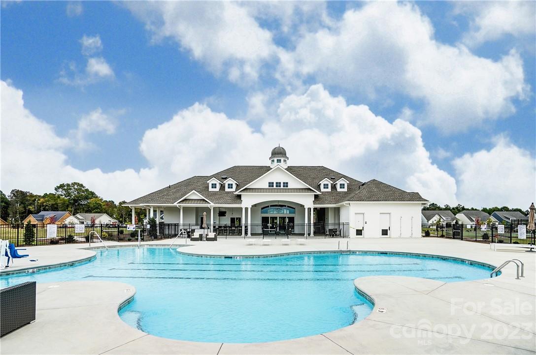 16327 Loch Raven Road Huntersville, NC 28078 - Photo 38 of 42 a front view of a house with swimming pool
