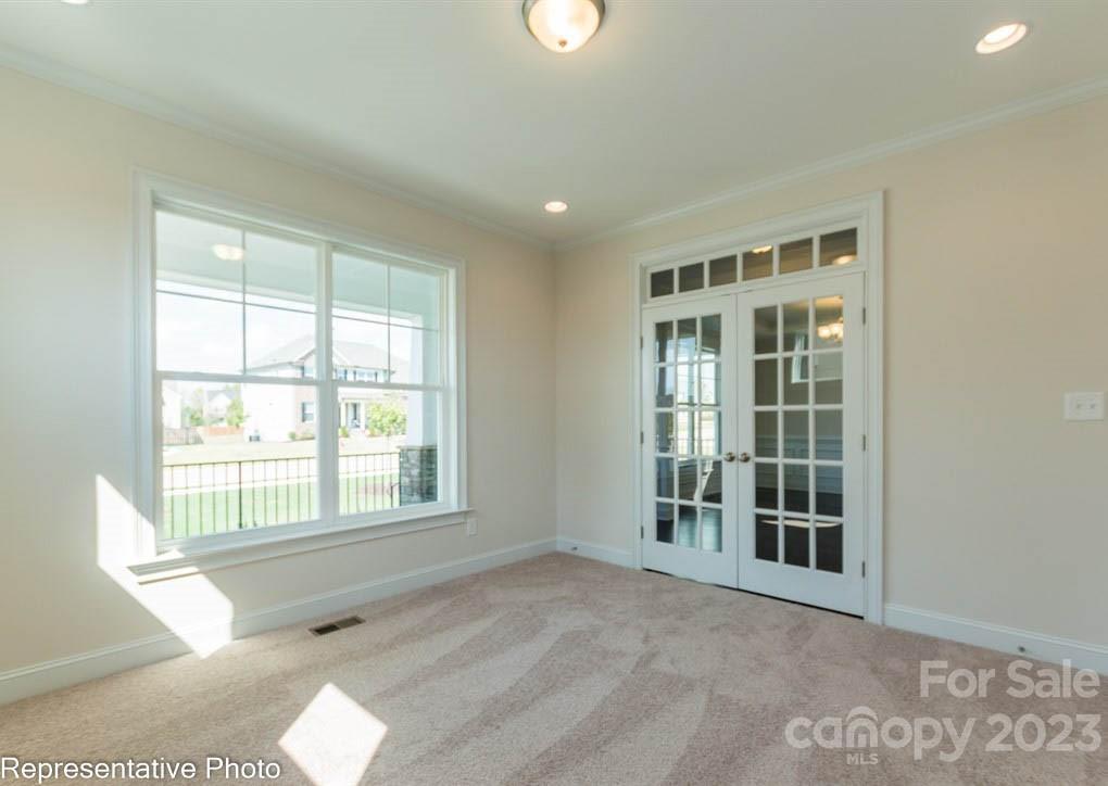 16327 Loch Raven Road Huntersville, NC 28078 - Photo 6 of 42 a view of an empty room with a window