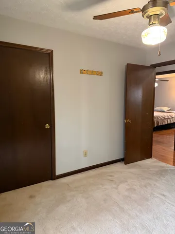 a view of a livingroom with a bathroom