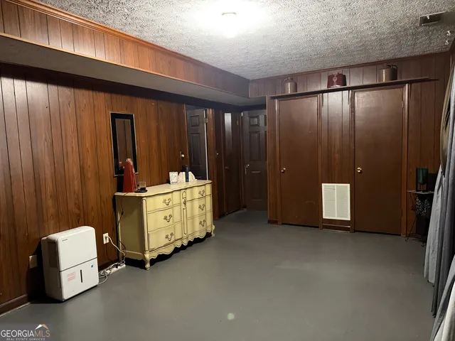 a room with furniture and closet