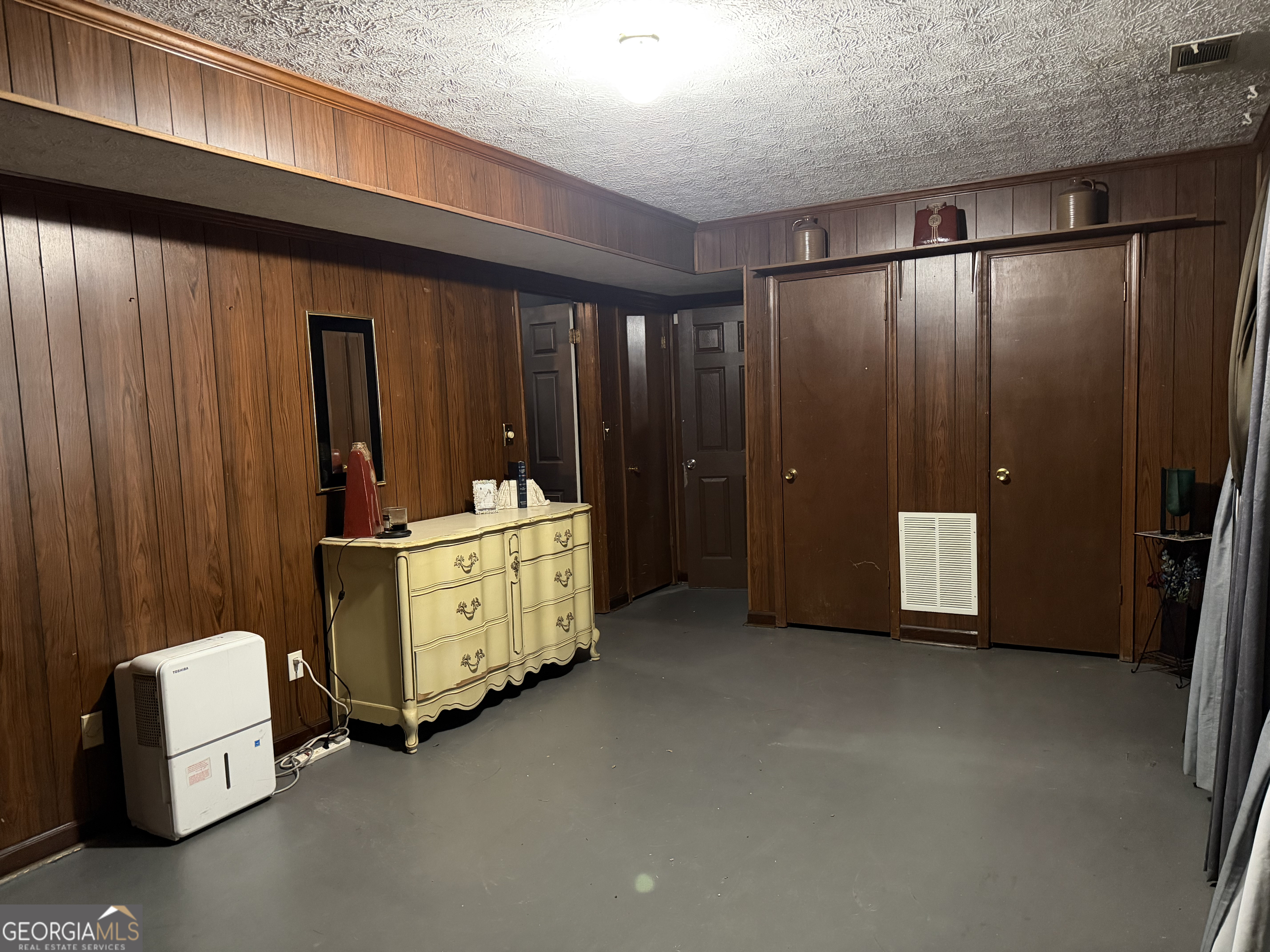 3403 Hidden Lane Rex, GA 30273 - Photo 21 of 27 a room with furniture and closet