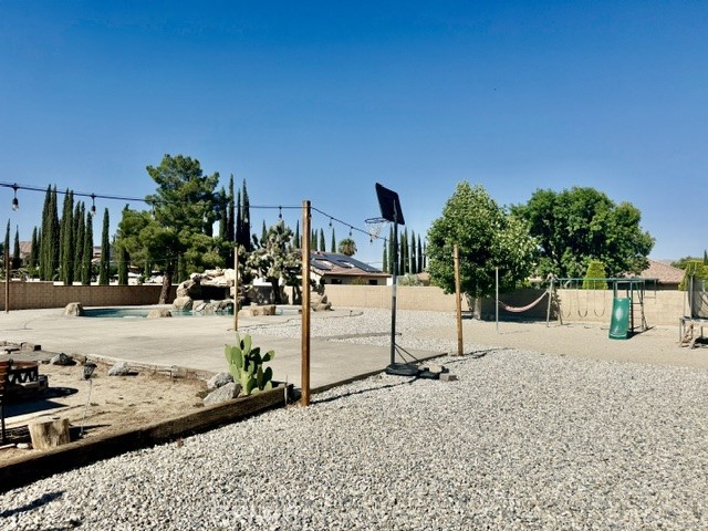 13375 Rincon Road Apple Valley, CA 92308 - Photo 71 of 72 Backyard / swing set