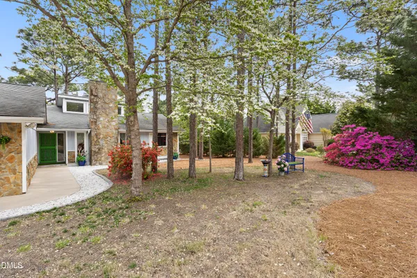 a view of a bench in a yard