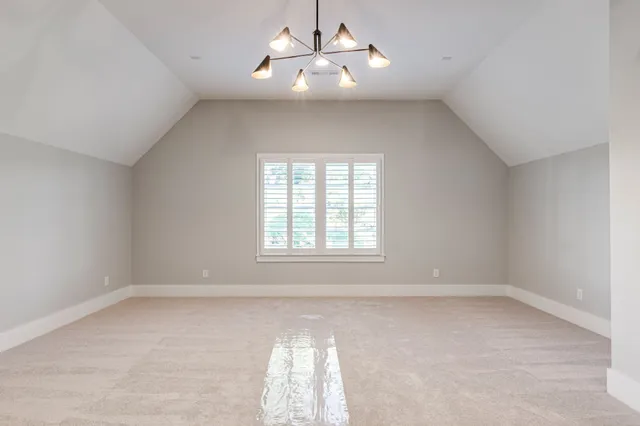 a picture of a bathroom with a shower