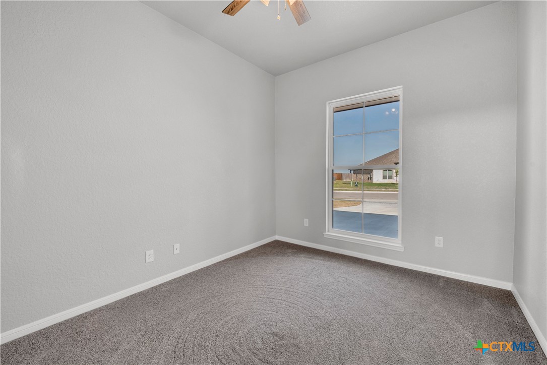 215 Overlook Trail Copperas Cove, TX 76522 - Photo 18 of 36 an empty room with a empty space and windows