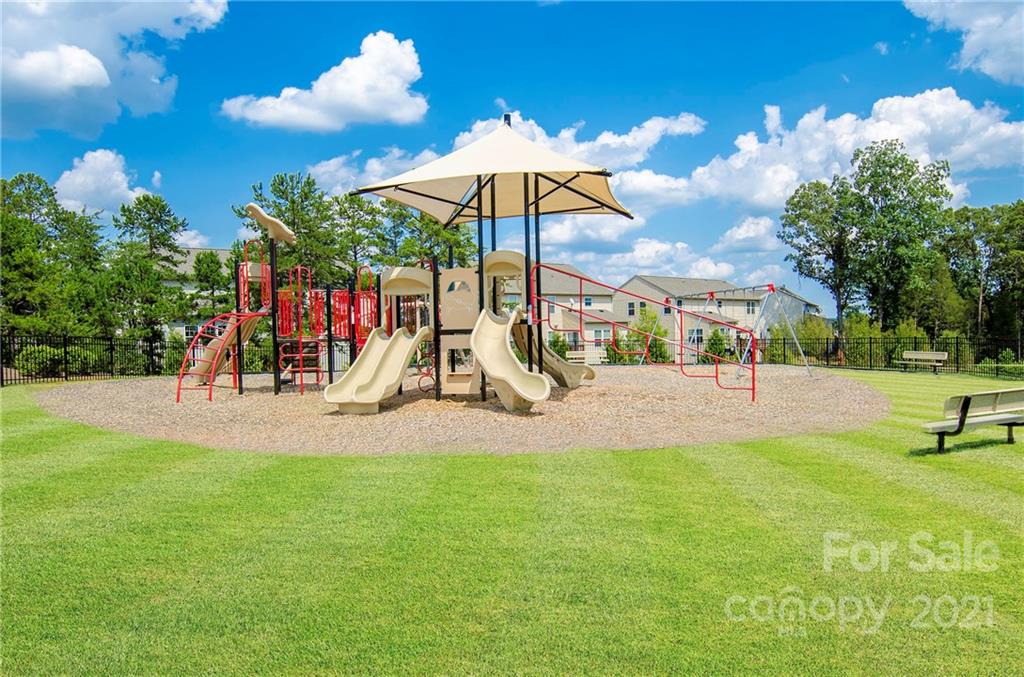 7230 Waterwheel Street Southwest, Unit 100 Concord, NC 28025 - Photo 21 of 23 a view of a park with slide