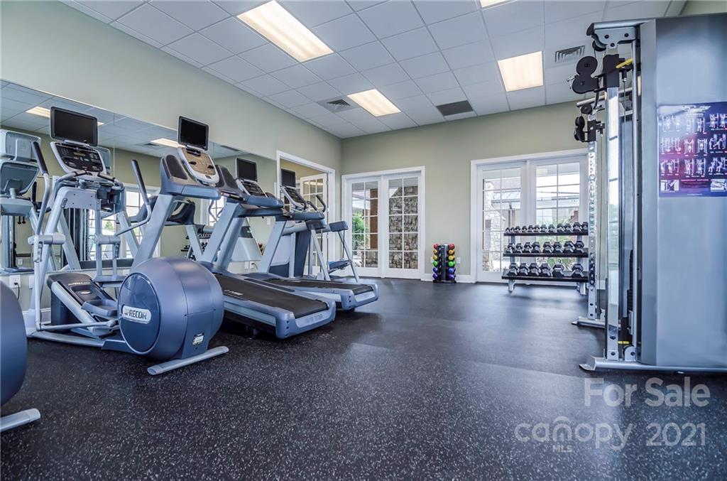 7230 Waterwheel Street Southwest, Unit 100 Concord, NC 28025 - Photo 23 of 23 a view of a room with gym equipment