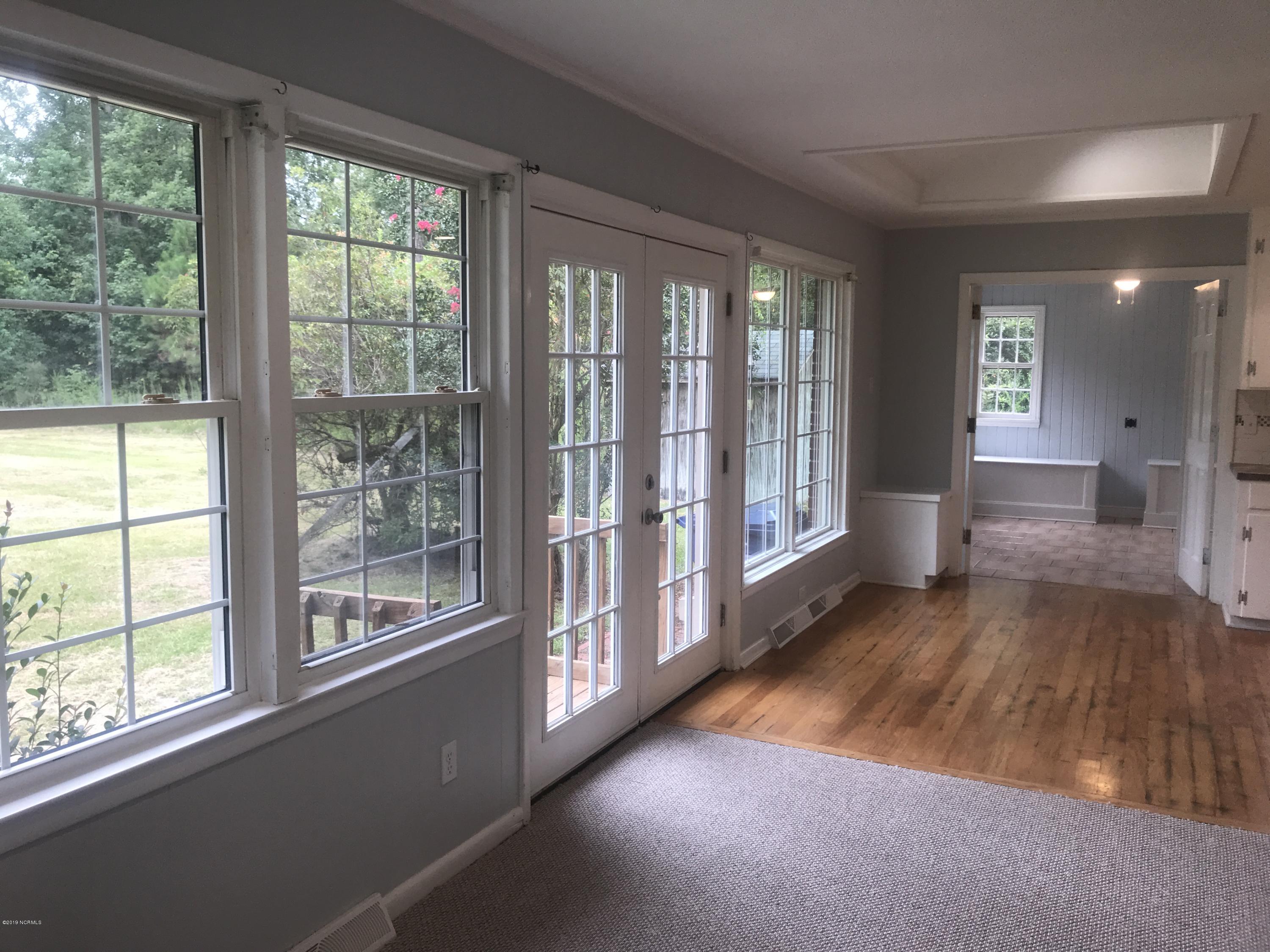 2110 Hardee Road Kinston, NC 28504 - Photo 16 of 23 den into dining area off of kitchen