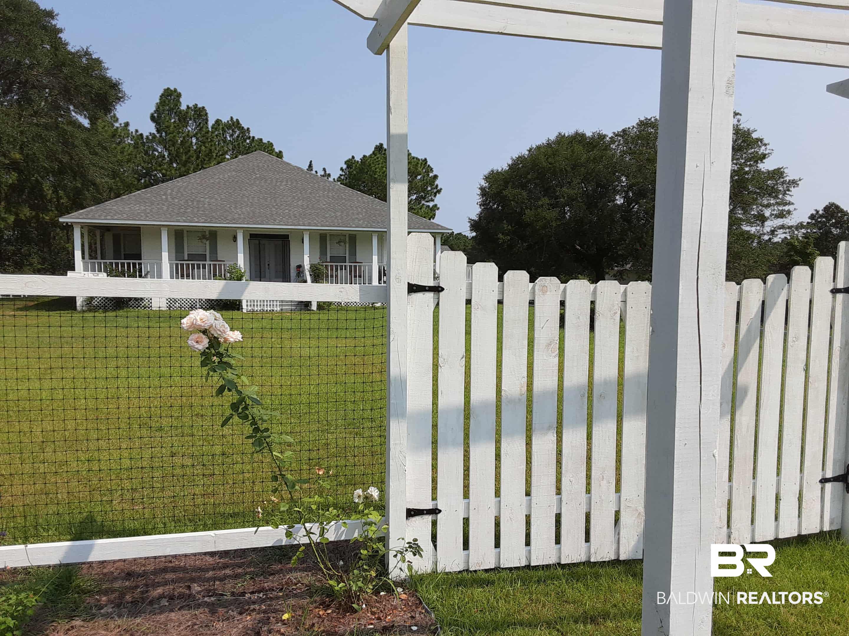 7650 Iron Rush Road Wilmer, AL 36587 - Photo 7 of 34 View of front facade featuring a porch