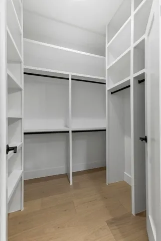 a view of an empty walk in closet