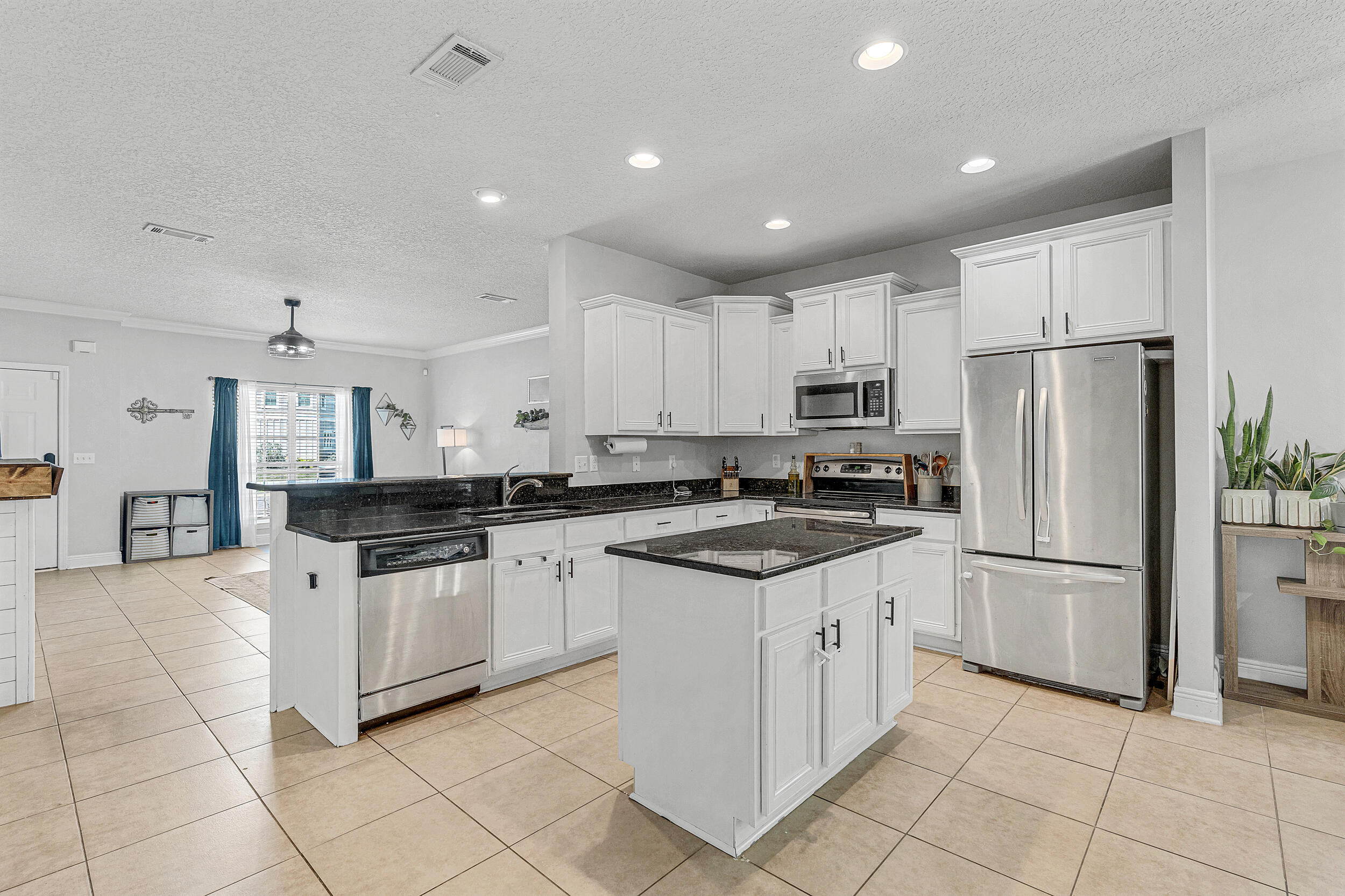 64 Rearden Way Santa Rosa Beach, FL 32459 - Photo 13 of 44 a kitchen with white cabinets appliances and sink