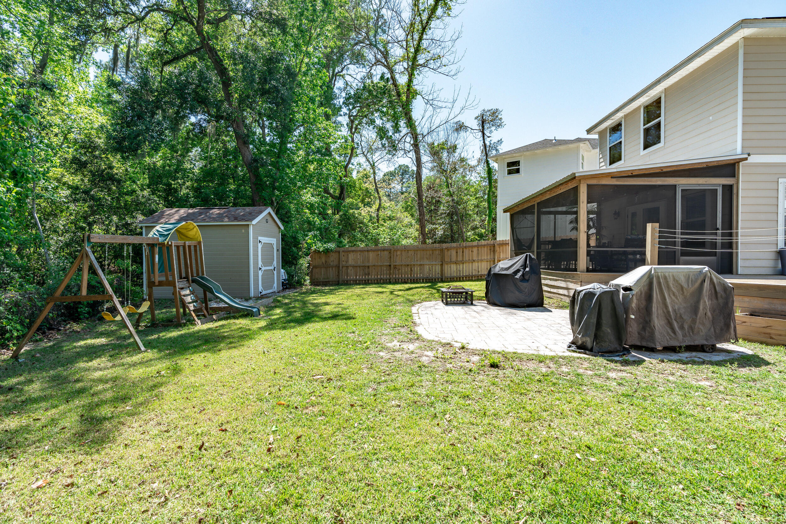 64 Rearden Way Santa Rosa Beach, FL 32459 - Photo 23 of 44 a view of a backyard with furniture and a tub