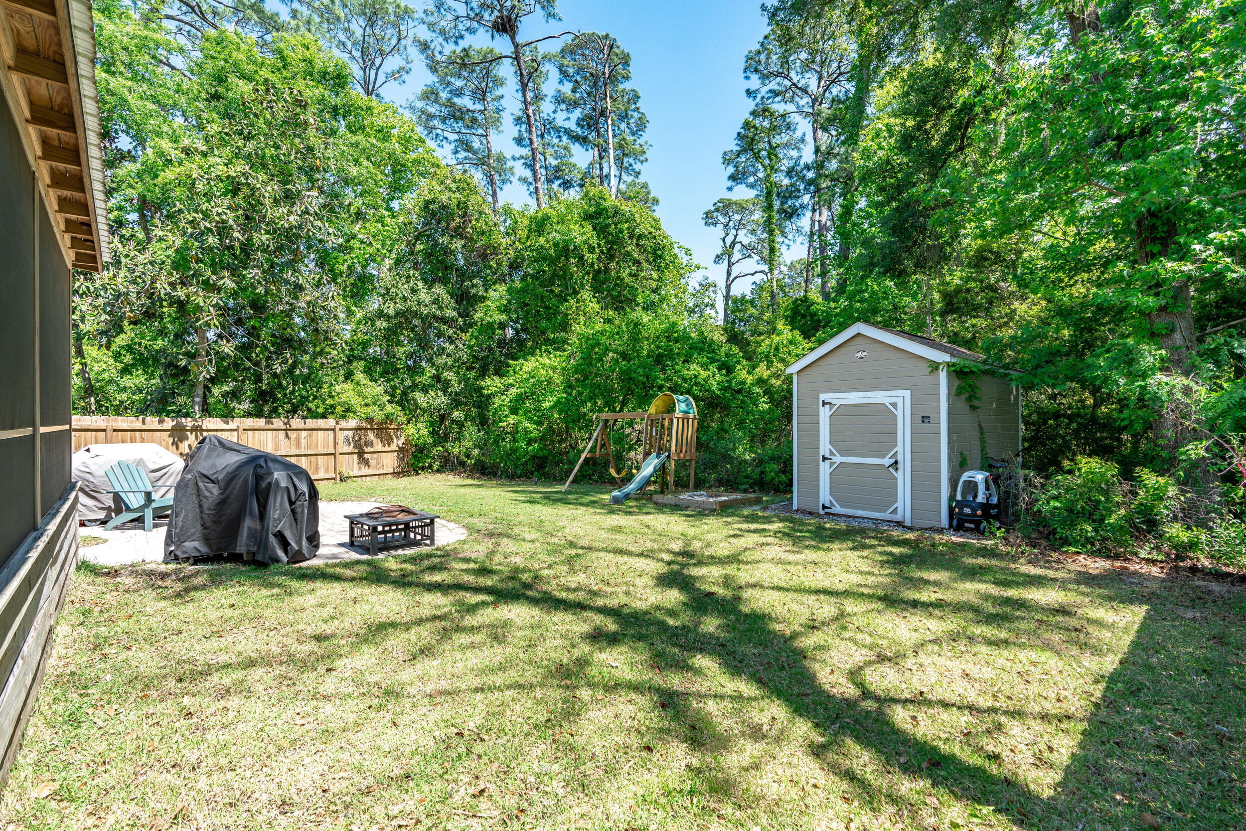 64 Rearden Way Santa Rosa Beach, FL 32459 - Photo 24 of 44 a view of a house with backyard