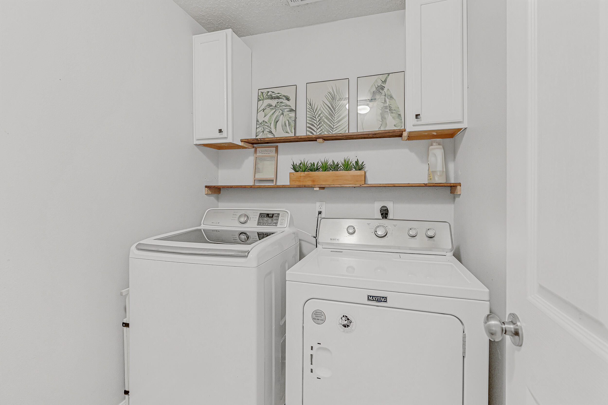 64 Rearden Way Santa Rosa Beach, FL 32459 - Photo 30 of 44 a utility room with dryer and washer