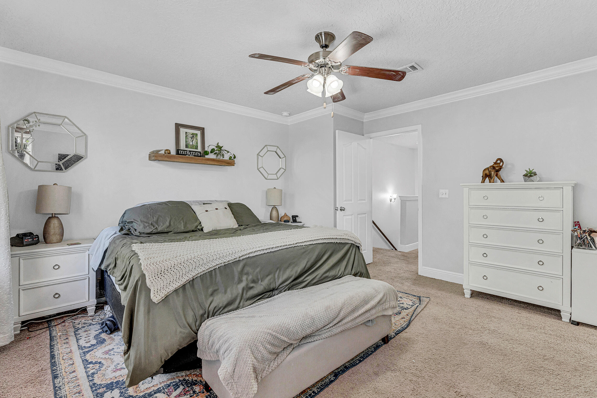 64 Rearden Way Santa Rosa Beach, FL 32459 - Photo 32 of 44 a bedroom with a bed and ceiling fan