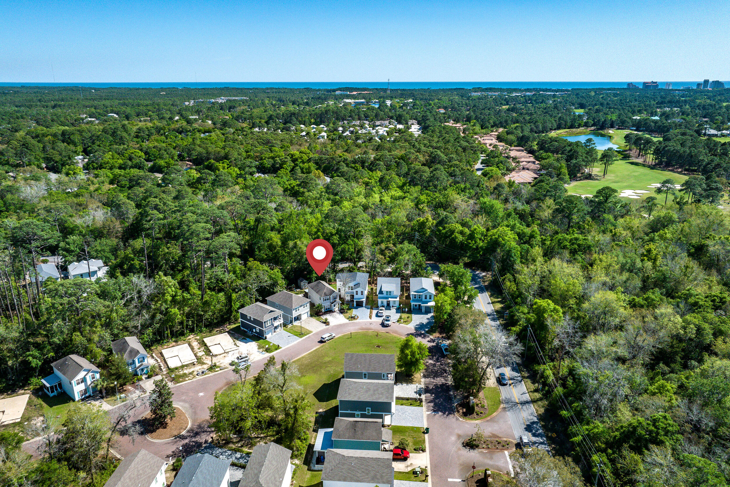 64 Rearden Way Santa Rosa Beach, FL 32459 - Photo 35 of 44 an aerial view of a houses with a yard