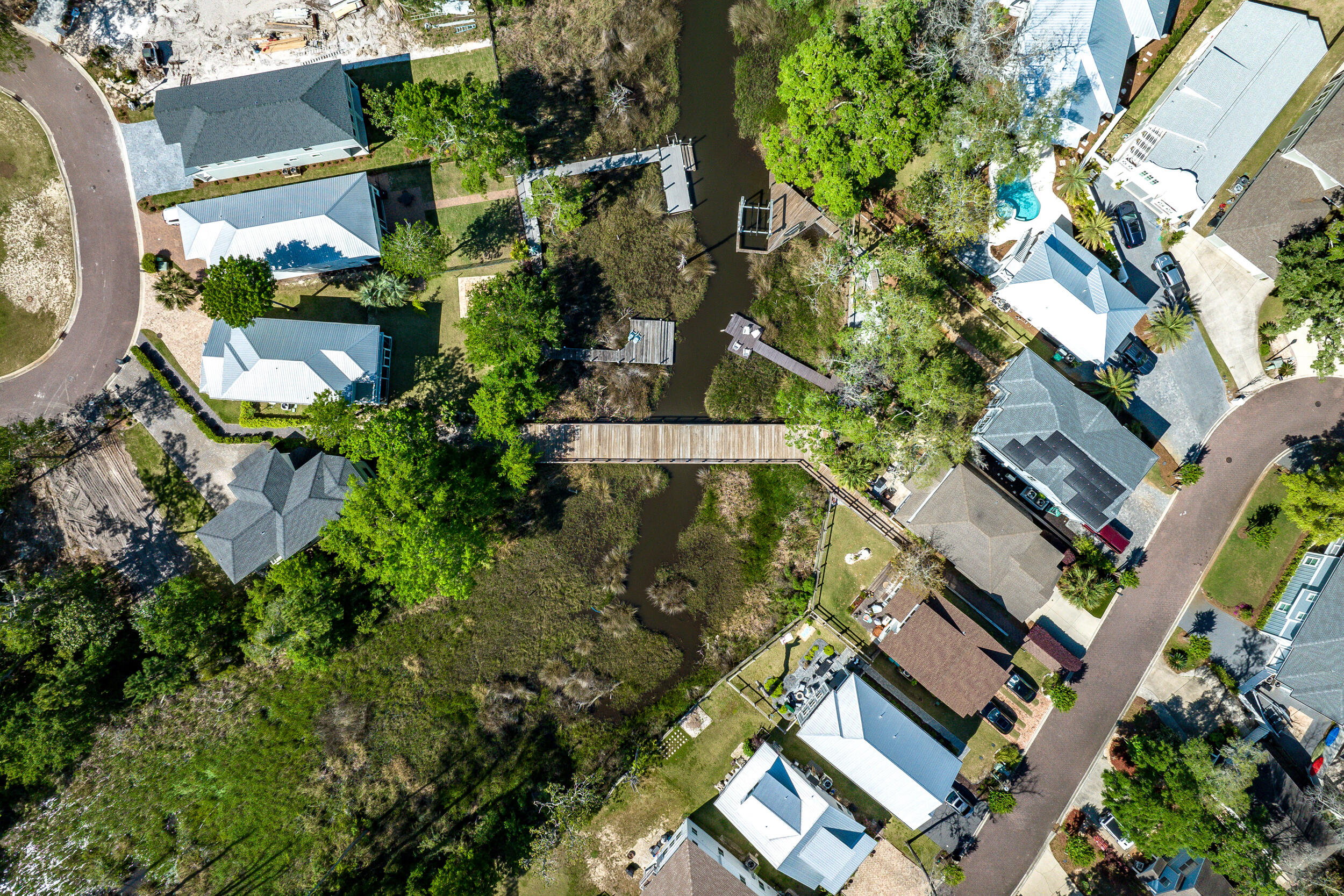 64 Rearden Way Santa Rosa Beach, FL 32459 - Photo 44 of 44 an aerial view of a house with a yard and garden