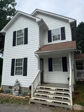 a front view of a house with a balcony