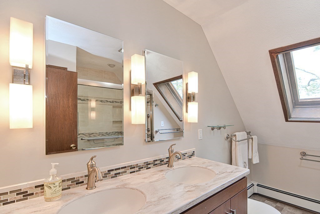 22 Wildwood Road Stow, MA 01775 - Photo 17 of 35 a bathroom with a sink and a mirror