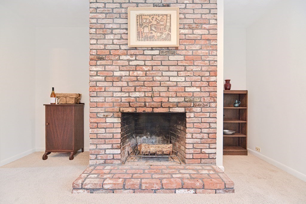 22 Wildwood Road Stow, MA 01775 - Photo 8 of 35 a living room with fireplace