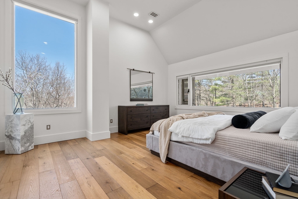 30 Whipple Road Lexington, MA 02420 - Photo 15 of 28 a bedroom with a bed and a large window