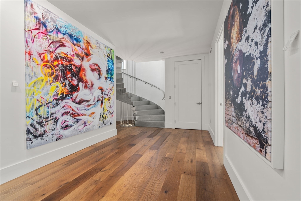 30 Whipple Road Lexington, MA 02420 - Photo 22 of 28 a view of a hallway with wooden floor