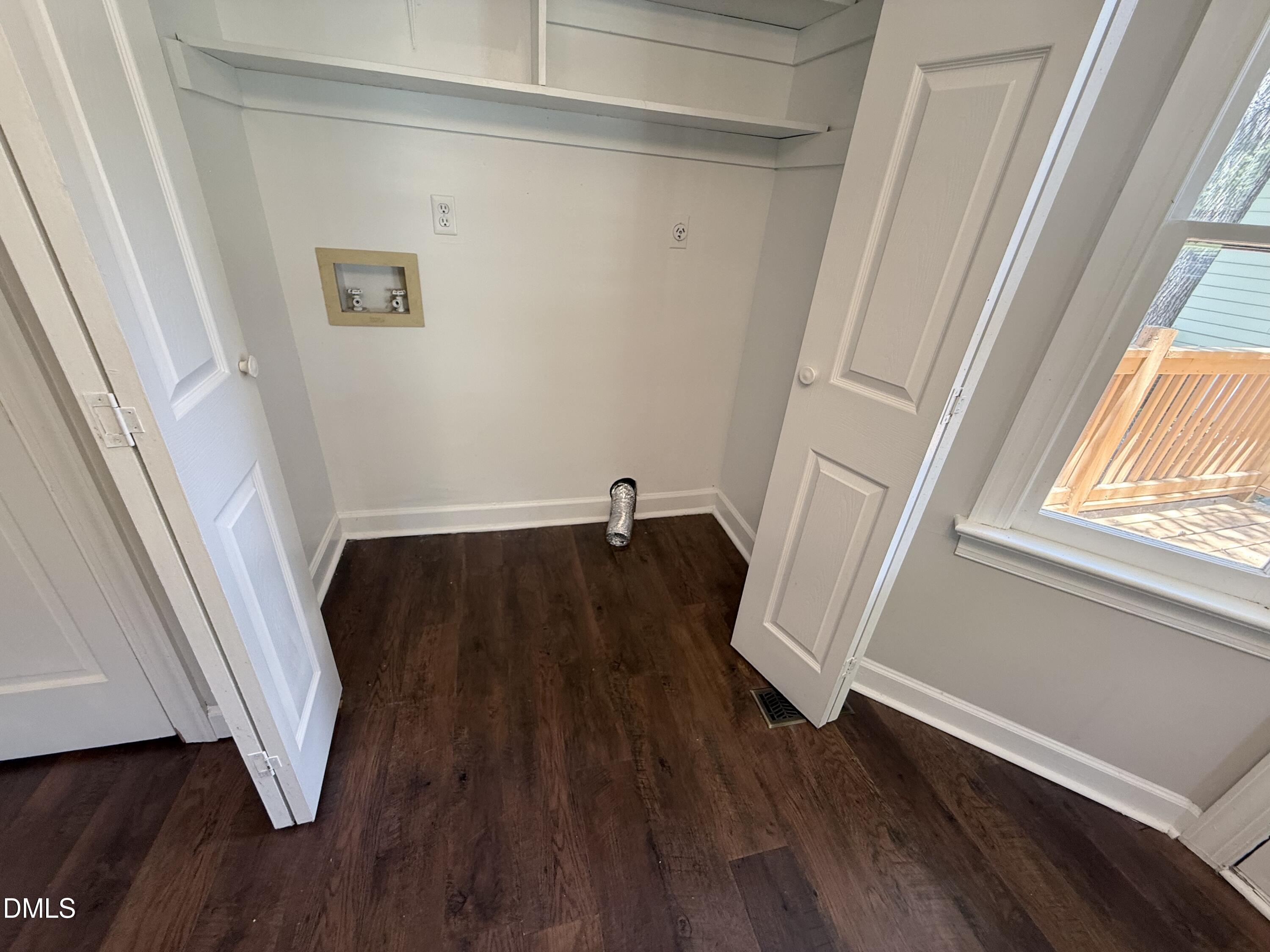 2900 Broadlands Drive Raleigh, NC 27604 - Photo 58 of 60 a view of front door with wooden floor and stairs