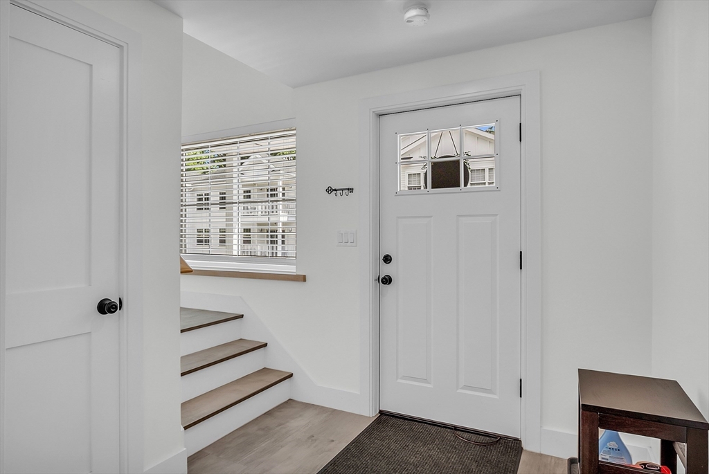 2253 Washington Street, Unit 2 Canton, MA 02021 - Photo 2 of 39 a view of a hallway with front door