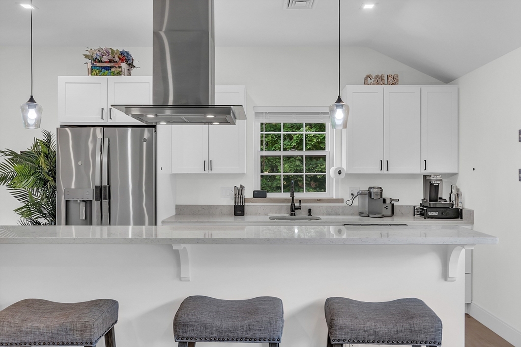 2253 Washington Street, Unit 2 Canton, MA 02021 - Photo 9 of 39 a kitchen with a sink cabinets and window