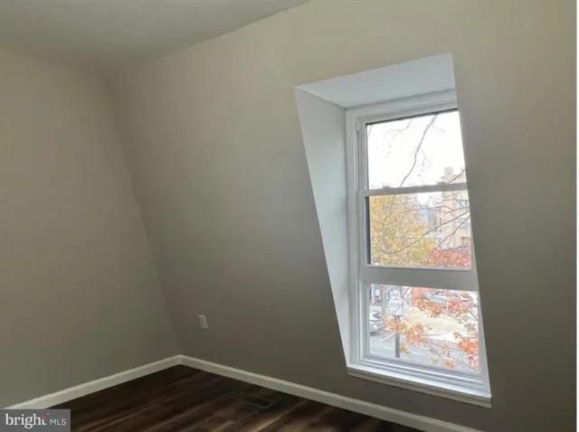 an empty room with window