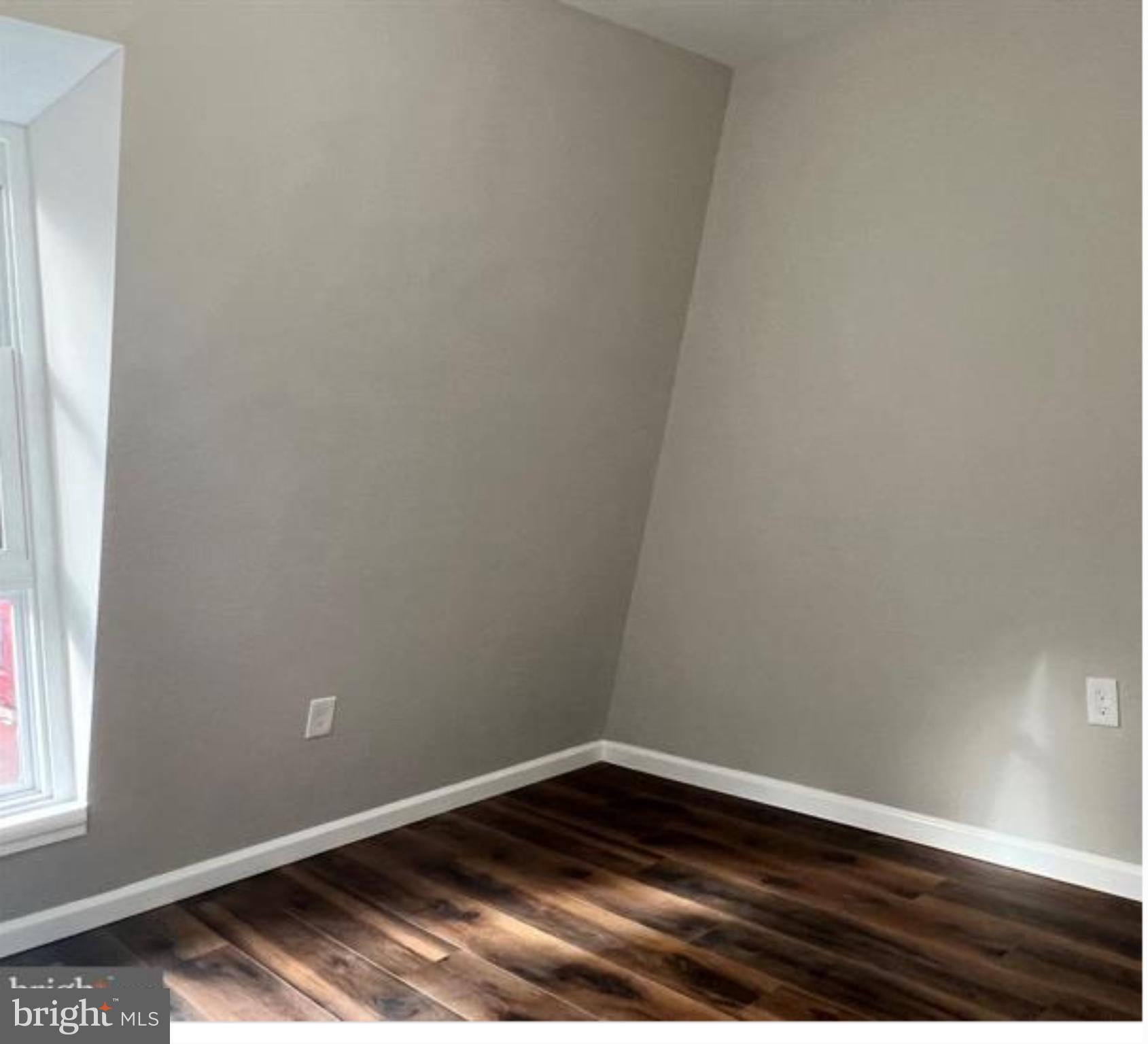 1206 11th Street Northwest Washington, DC 20005 - Photo 31 of 44 a view of an empty room and window