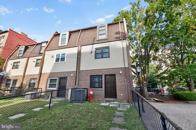 a front view of house with yard