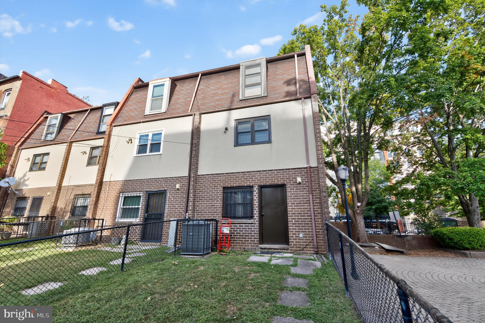 1206 11th Street Northwest Washington, DC 20005 - Photo 10 of 44 a front view of house with yard