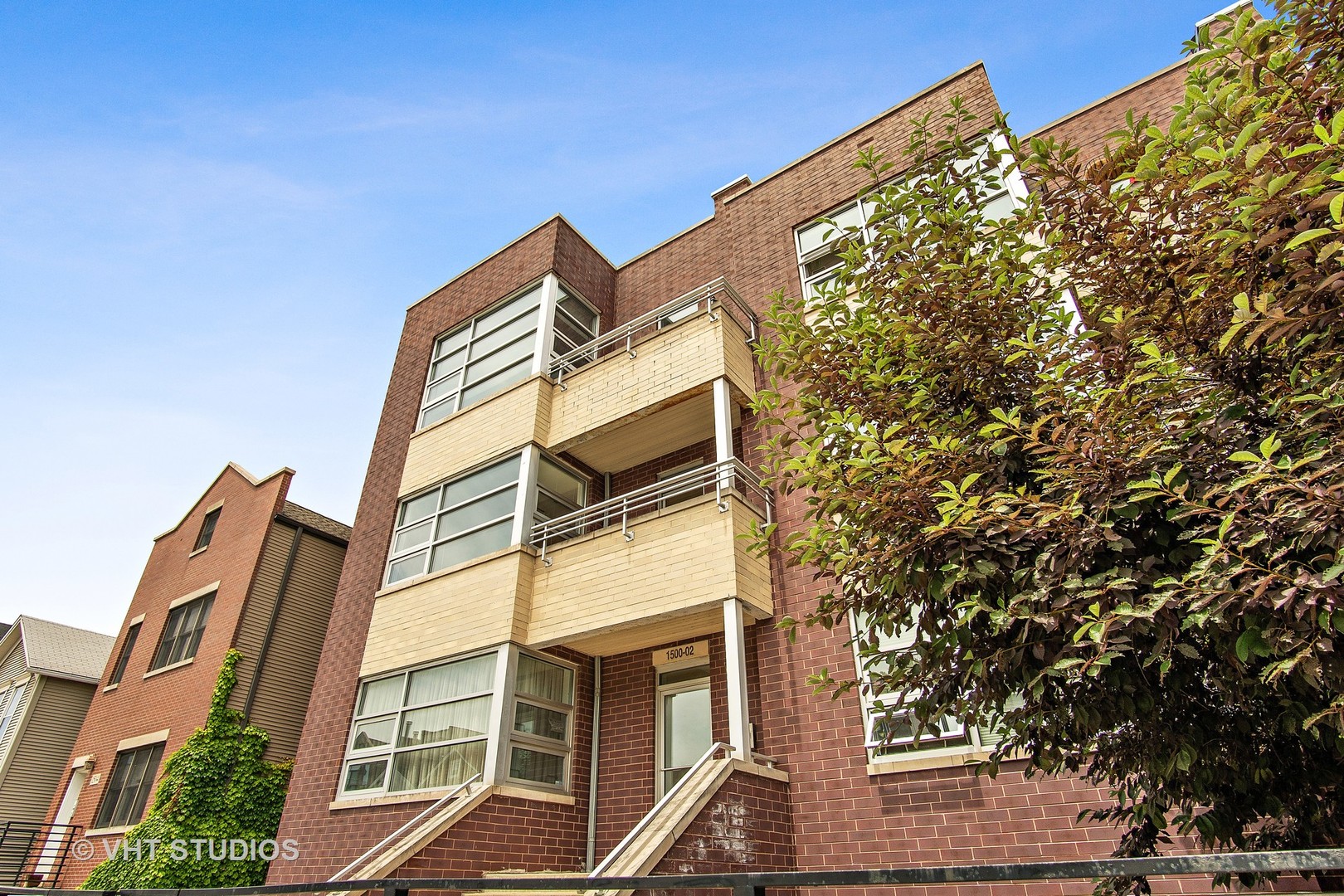 1502 West Augusta Boulevard, Unit 3W Chicago, IL 60642 - Photo 1 of 23 a front view of a building