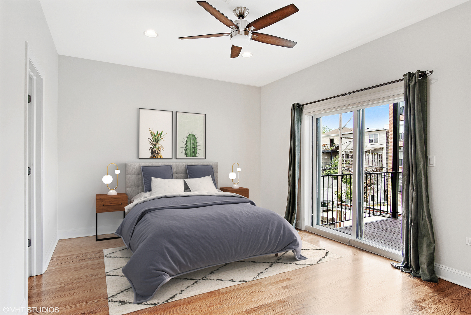 1502 West Augusta Boulevard, Unit 3W Chicago, IL 60642 - Photo 11 of 23 a bedroom with a large bed and a chandelier